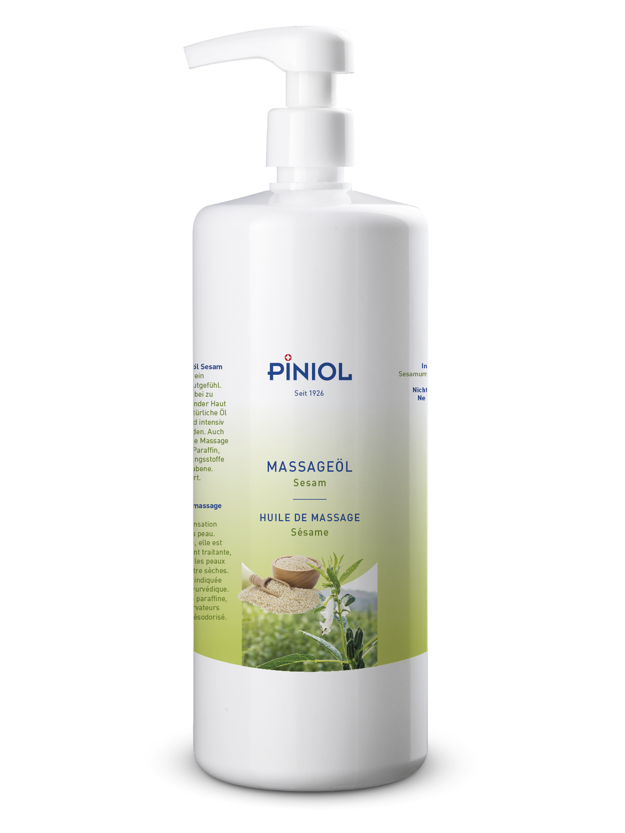 White 1-litre pump bottle Piniol Massage oil containing deodorised sesame oil. The green label features a wooden bowl full of sesame seeds and a flowering sesame plant, hinting at the nourishing ingredients.