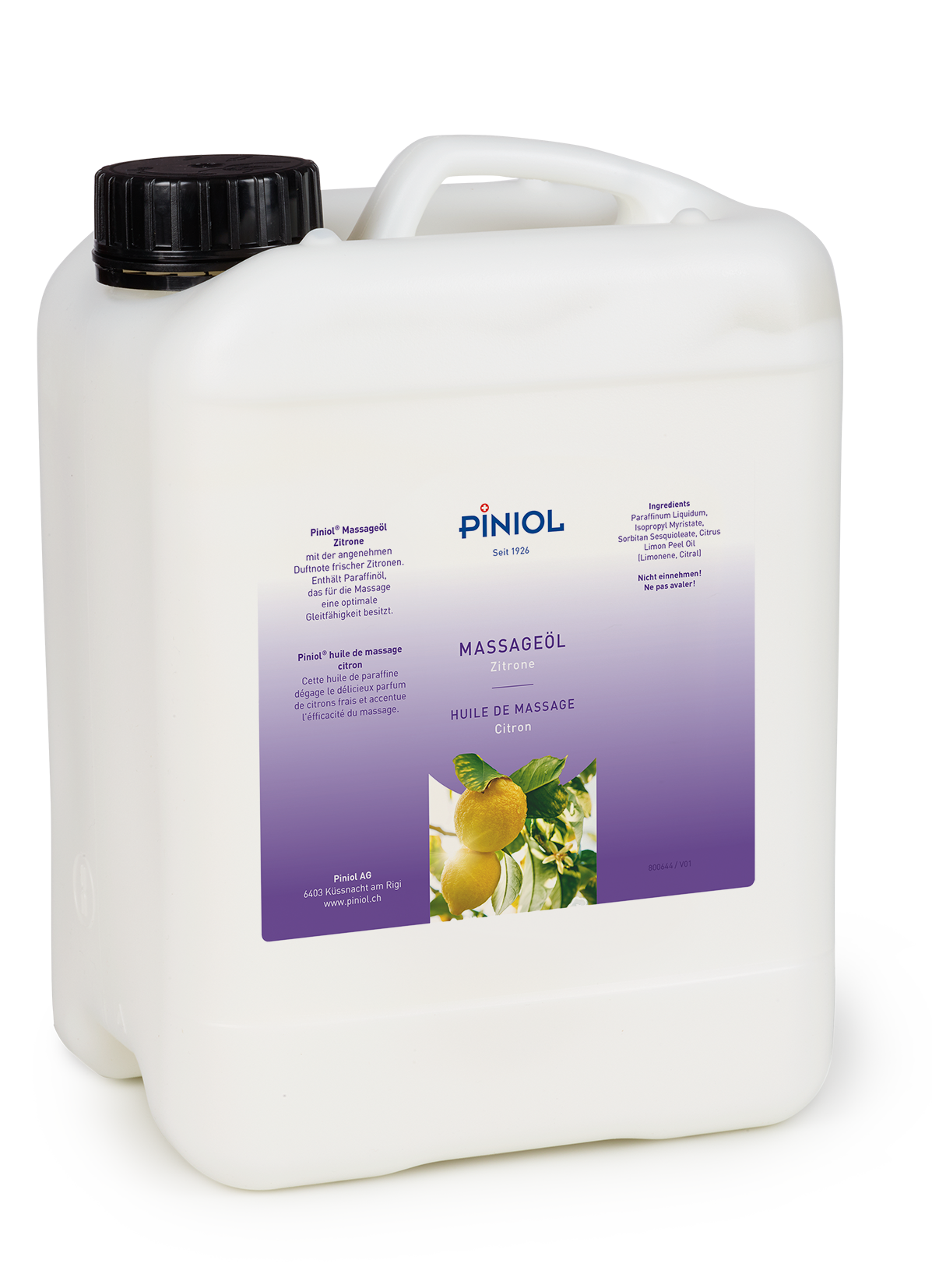 White container with a black lid and handle, featuring a purple label reading ‘Piniol Lemon Massage Oil’. Beneath this are two yellow lemons with leaves and blossoms. Nourishing for the skin, provides good glide during massages, with a lemon scent.