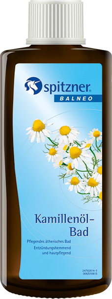 Flacon marron avec bouchon à vis blanc; étiquette bleue avec fleurs de camomille. Texte: «Spitzner Balneo Bain à l'huile de camomille», bain aux huiles essentielles nourrissant, anti-inflammatoire et soignant la peau.