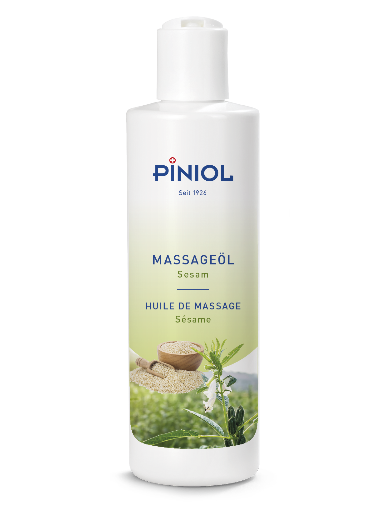 Piniol ’s white bottle of sesame massage oil with a white flip-top cap. The label shows the product name, with a bowl of sesame seeds and a spoon beneath it, as well as a flowering sesame plant against a field backdrop to indicate its origin.