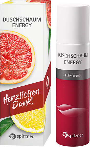 Emballage cadeau blanc et bombe aérosol rouge « Spitzner » de mousse de douche ENERGY. Boîte avec quartiers de pamplemousse rouge et citron jaune, mention « Merci beaucoup ! ». Aérosol avec nom du produit et « énergisant ».