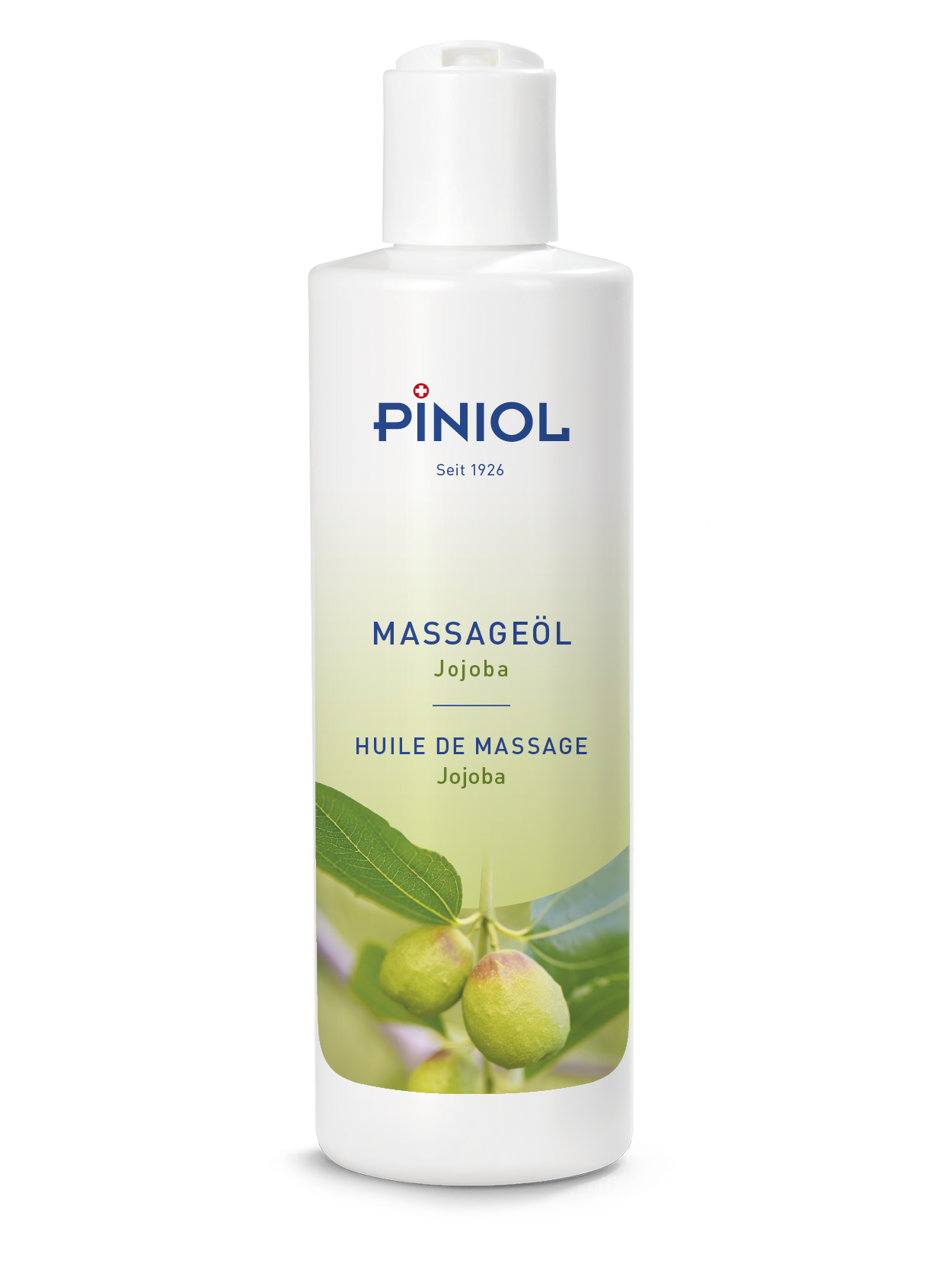 Piniol Jojoba Massage Oil in a white bottle with a white flip-top cap. The label features the blue ‘ Piniol ’ logo and the words ‘MASSAGE OIL Jojoba’. At the bottom are green leaves and two light green jojoba fruits on a green-and-white gradient.