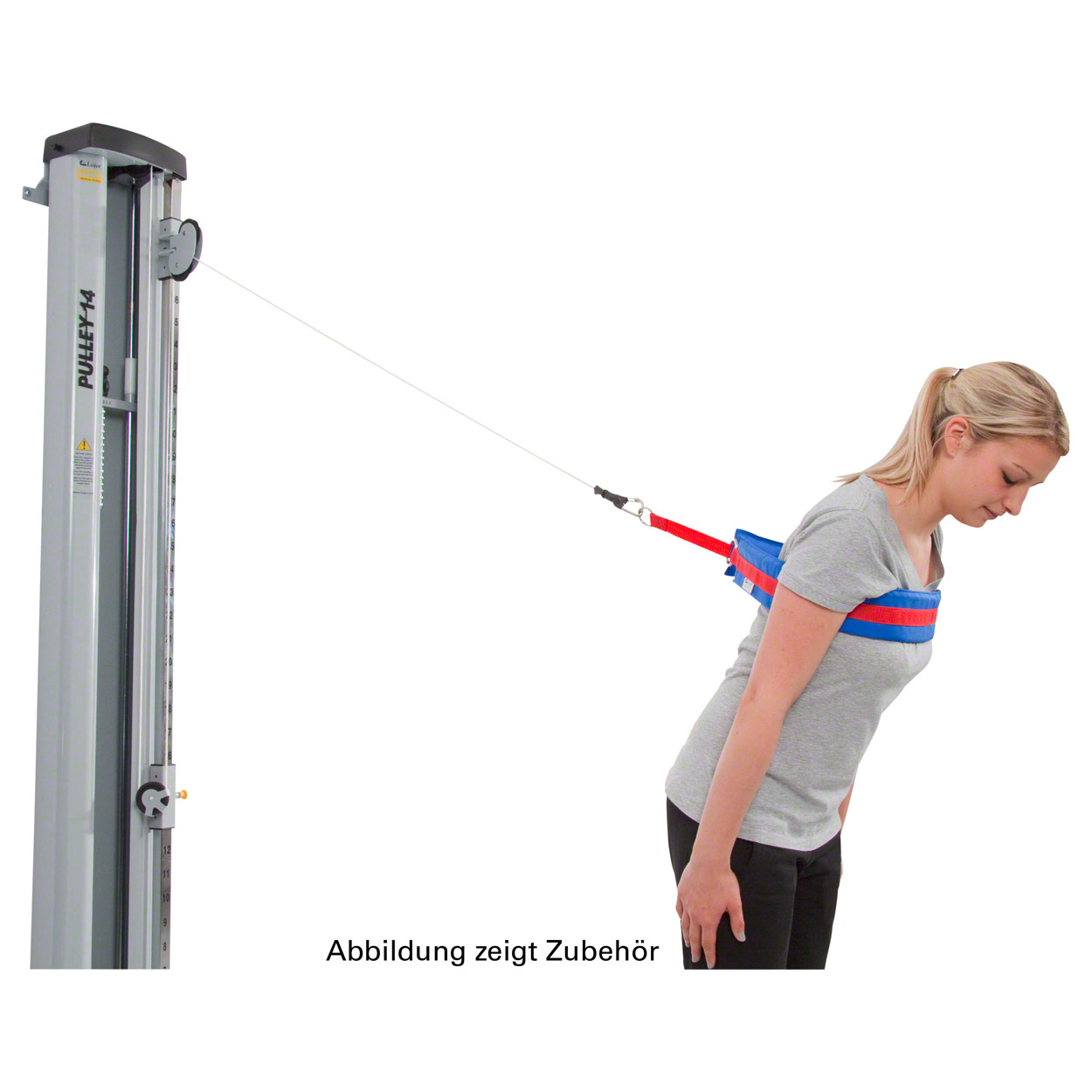 A young woman demonstrates an exercise using a red and blue, padded cable pulley belt around her upper back and shoulders. A cable connects the belt to the grey ‘PULLEY 14’ cable pulley machine on the left via a carabiner, whilst she bends forwards.