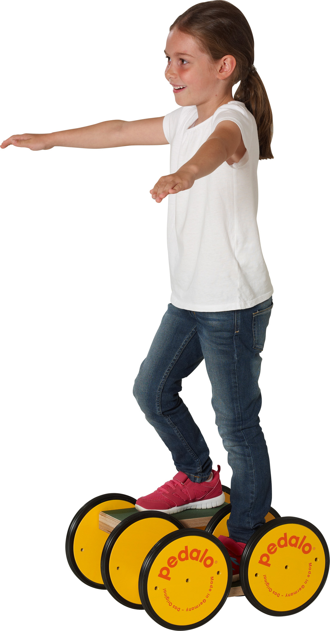 A girl is balancing on a Pedalo with twin wheels, smiling and with her arms outstretched to the sides. She is wearing a T-shirt, jeans and pink trainers.